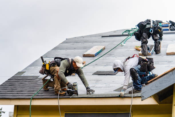 Professional Roof Replacement technician working in Yachats, OR